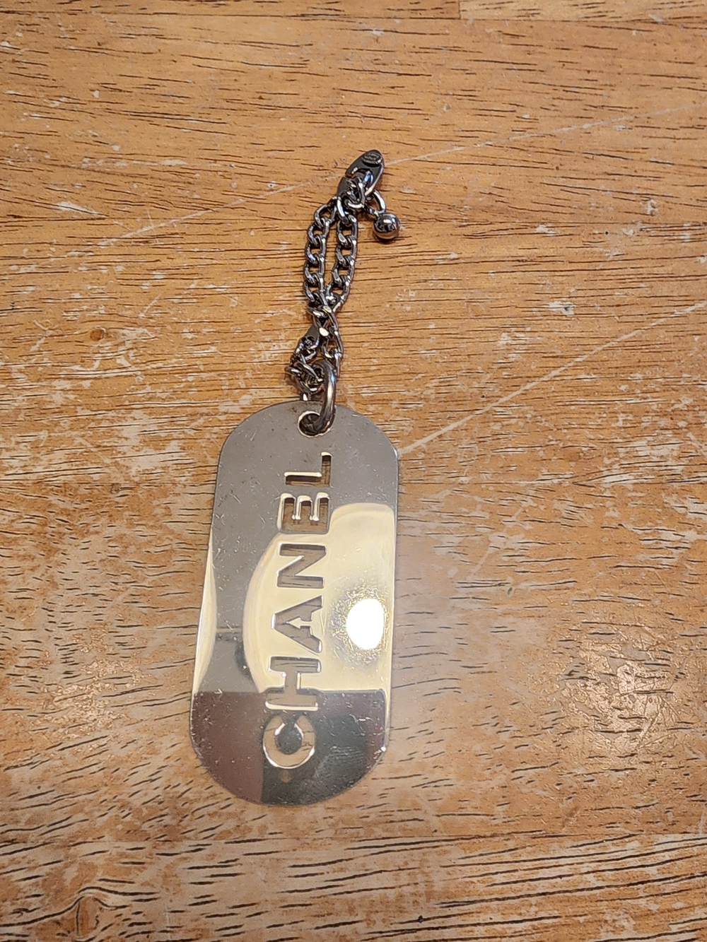 authentic vintage Chanel Cut-Out Logo Dog Tag Keyring / Bag Charm from the 2004
